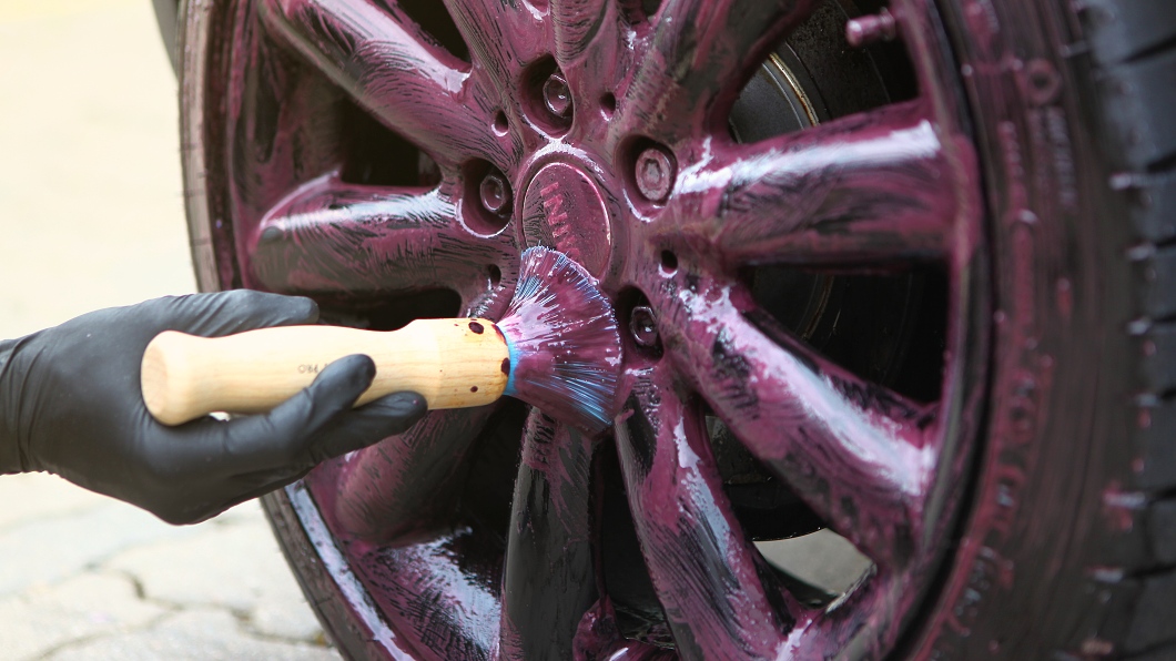 wheel maintenance with a brush